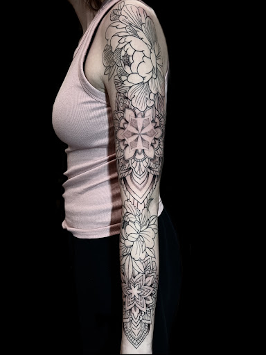 Explore tribal head tattoo ideas, creative tattoo ideas in Newtonville, available at Nirvana Tattoo Studio