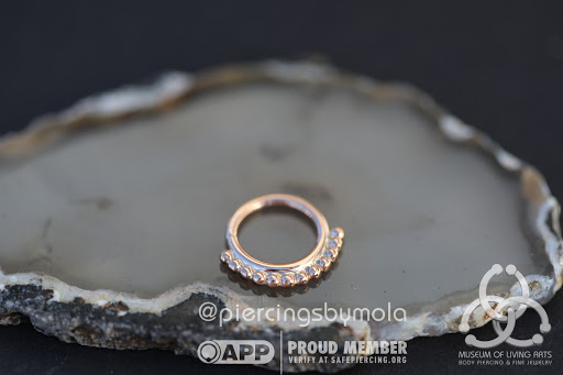 Explore back tattoo ideas for women, creative tattoo ideas in Charleston, available at MOLA Piercing and Fine Jewelry