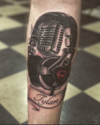 Explore catfish tattoo ideas, creative tattoo ideas in Stevens Point, available at Black Rabbit Tattooing