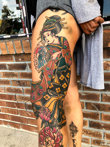 Explore butterfly back tattoo ideas, creative tattoo ideas in Jacksonville, available at Idle Hands Tattoo Co.