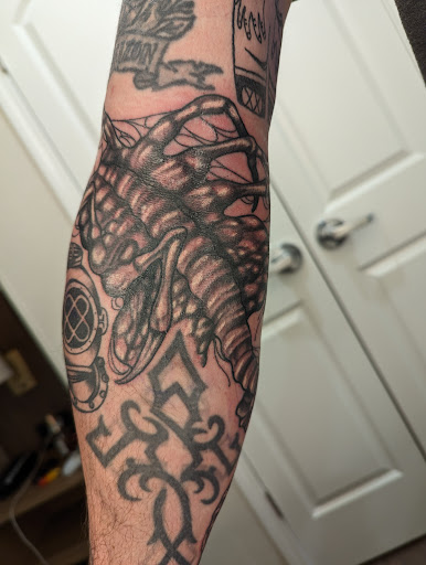 Explore malcolm x tattoo ideas, creative tattoo ideas in Jackson, available at Electric Dagger