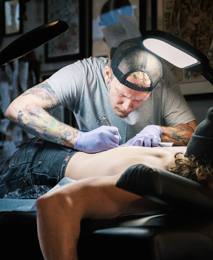 Explore colour tattoo sleeve ideas, creative tattoo ideas in Vancouver, available at Hopeless Tattoo & Piercing