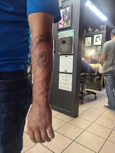 Explore women's leg tattoo ideas, creative tattoo ideas in Denison, available at Mad House Tattoos