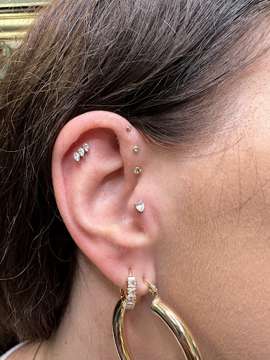 Explore clock hand tattoo ideas, creative tattoo ideas in Clearwater, available at Moniques Body Art