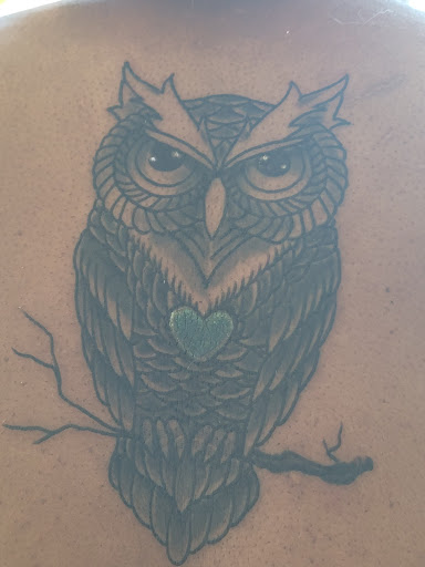 Explore military dog tag tattoo ideas, creative tattoo ideas in Marietta, available at Sink or Swim Studio and Gallery