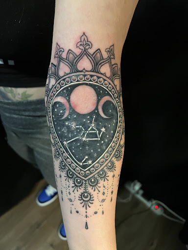 Explore cherub tattoo ideas, creative tattoo ideas in Chicago, available at Twisted Tattoo Studio