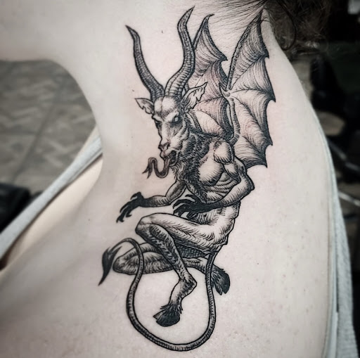 Explore bottom leg tattoo ideas, creative tattoo ideas in Buffalo, available at Grey Havens Tattoo