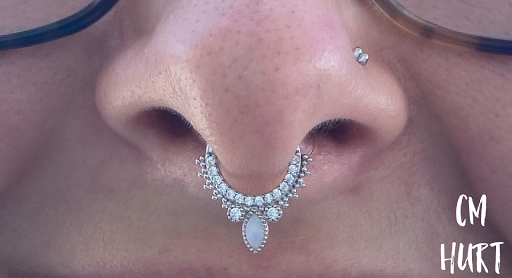 Explore checkered flag tattoo ideas, creative tattoo ideas in Garden Grove, available at CM Hurt Piercing & Jewelry