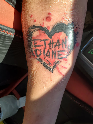 Explore running tattoos ideas, creative tattoo ideas in Buford, available at Wild Tribe Tattoos and Piercings