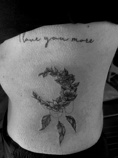 Explore yolo tattoo ideas, creative tattoo ideas in North Tonawanda, available at Dark Side Ink Tattoo Studio