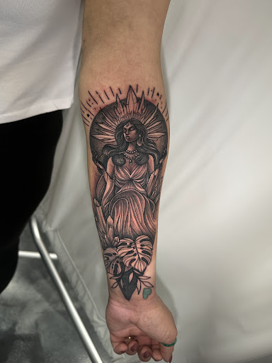 Explore front neck tattoo ideas, creative tattoo ideas in Stockbridge, available at Black Rose Tattoo Collective