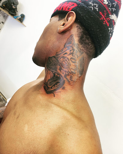 Explore lip tattoo ideas for men, creative tattoo ideas in Memphis, available at Inkatsuki Tattoos Art Studio