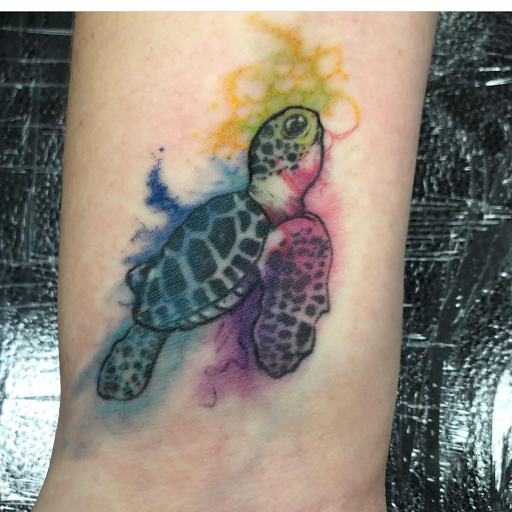 Explore large flower tattoo ideas, creative tattoo ideas in Aledo, available at Elevated Tattoo & Piercing