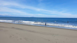 Foto di Wuweigang Beach con costa lunga e dritta