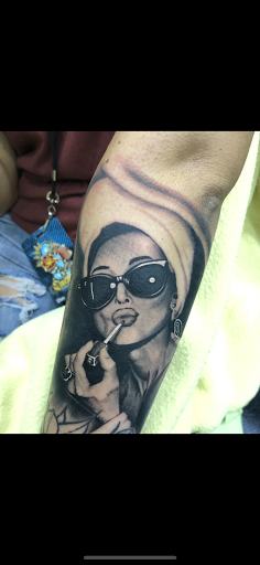 Explore birth year tattoo ideas for guys, creative tattoo ideas in Middletown, available at Traditionally Twisted Tattoo