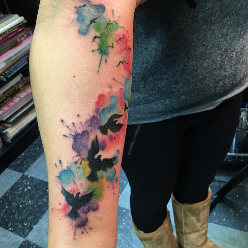 Explore spine tattoo cover up ideas, creative tattoo ideas in Deerfield, available at Maximum Tattoo
