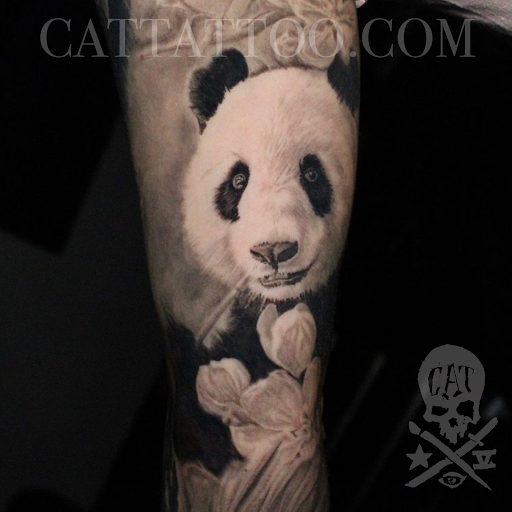 Explore blackout sleeve tattoo ideas, creative tattoo ideas in Addison, available at Cat Tattoo