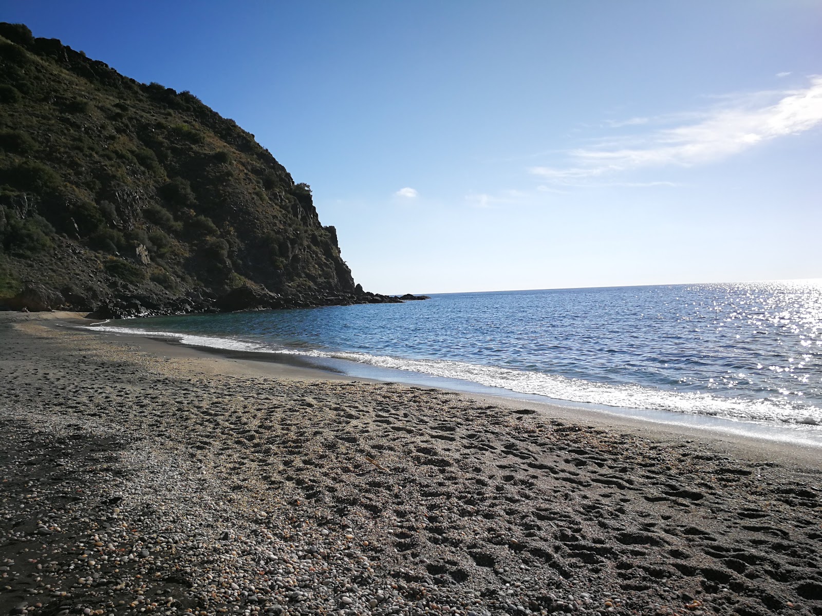 Playa de Curumbico'in fotoğrafı küçük koy ile birlikte