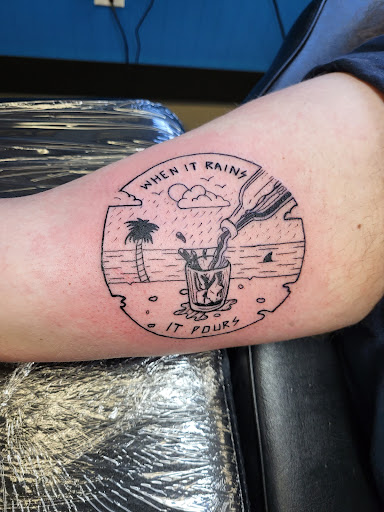 Explore memorial dog tattoo ideas, creative tattoo ideas in Green Bay, available at Wizard Ink Tattoo Company