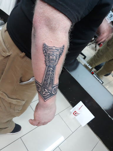 Find wave tattoo ideas for your next unique tattoo in San Antonio at Adrenaline Tattoo & Body Piercing