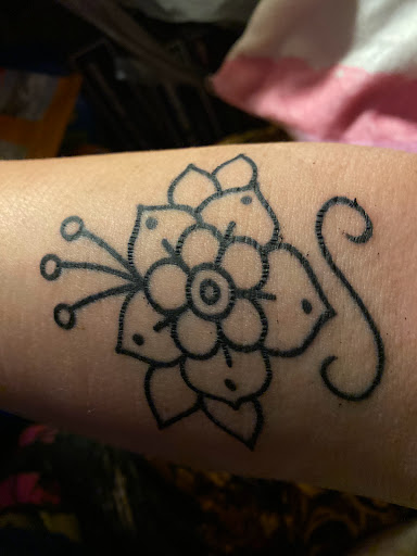 Explore matching husband and wife tattoo ideas, creative tattoo ideas in Kingsport, available at The tattoo shoppe