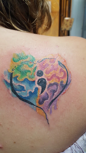 Explore small bee tattoo ideas, creative tattoo ideas in Houghton, available at Edge Tattoo Inc
