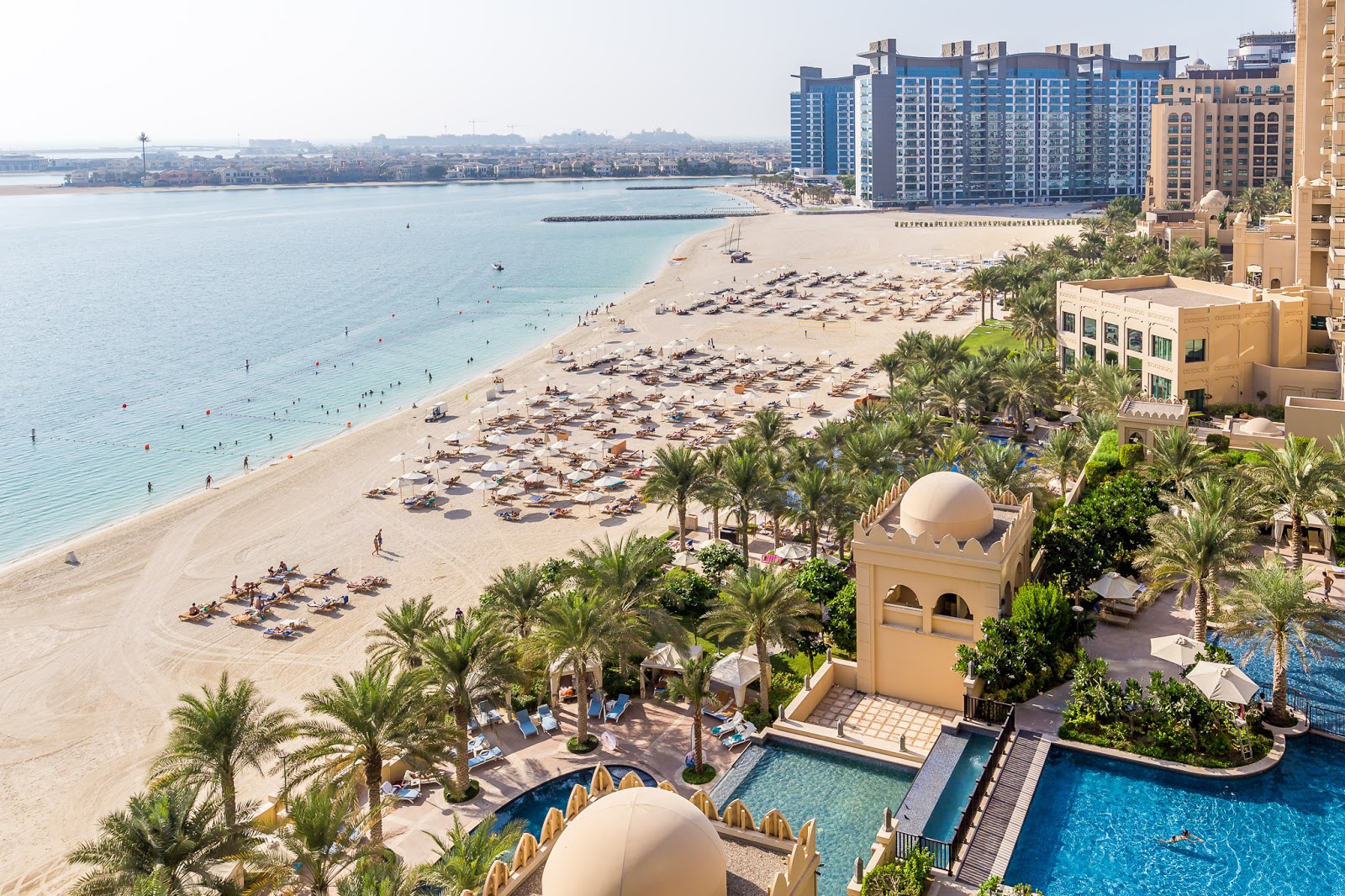 Photo of Palm West beach with bright fine sand surface