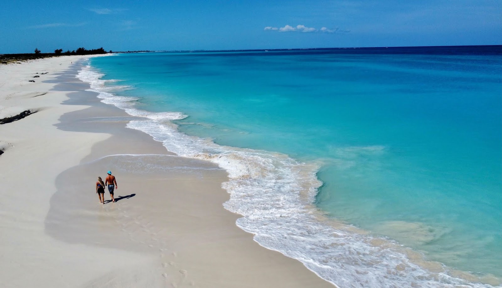 Photo of Pine Cay beach with bright fine sand surface