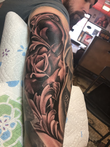 Explore guitar tattoo ideas, creative tattoo ideas in Junction City, available at New Era Tattoo Studio