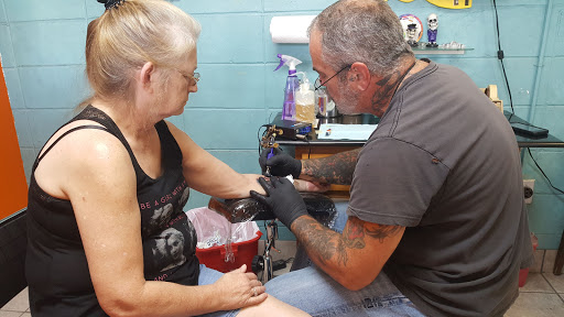 Explore fishing tattoo ideas for females, creative tattoo ideas in Jackson, available at Eternal Body Art