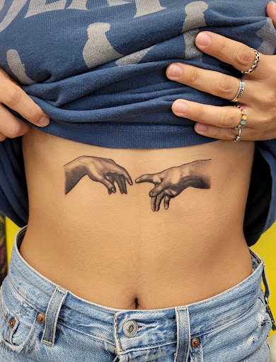 Explore finger word tattoos ideas, creative tattoo ideas in Houston, available at The Electric Chair Tattoo & Piercing