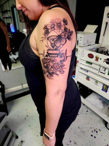 Explore snake tattoo idea, creative tattoo ideas in Loogootee, available at The Inkspot Tattoo Shop LLC