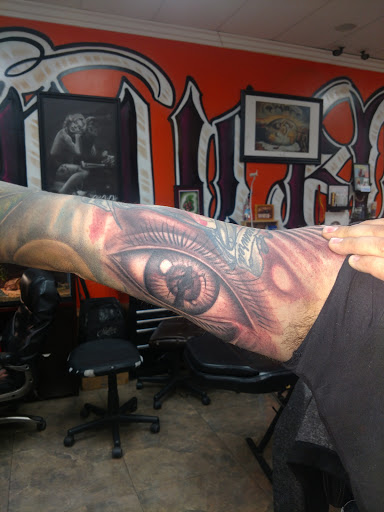 Explore day of the dead tattoos ideas, creative tattoo ideas in Colton, available at knuckleheads tattoo