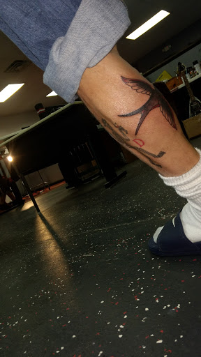 Tattoo Shop «AWOL Custom Tattooing Llc», reviews and photos, 1780 W Sherman Blvd, Muskegon, MI 49441, USA