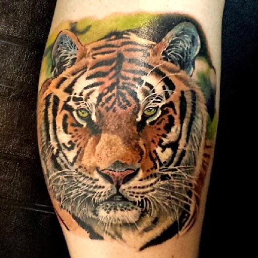 Explore thigh tattoo ideas men, creative tattoo ideas in Miami, available at INKAHOLIK TATTOOS