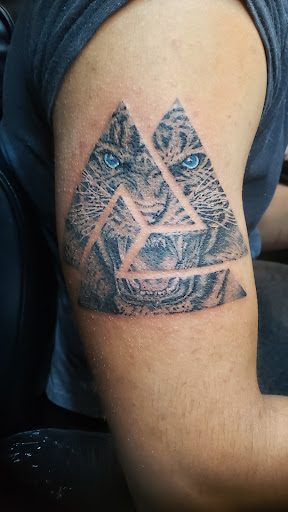 Explore tattoos on hand ideas, creative tattoo ideas in Lagrangeville, available at Black Cherry Tattoo Studio NY
