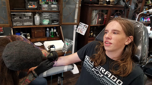 Explore angel forearm tattoo ideas, creative tattoo ideas in Lakeland, available at Holy Grail Tattoo