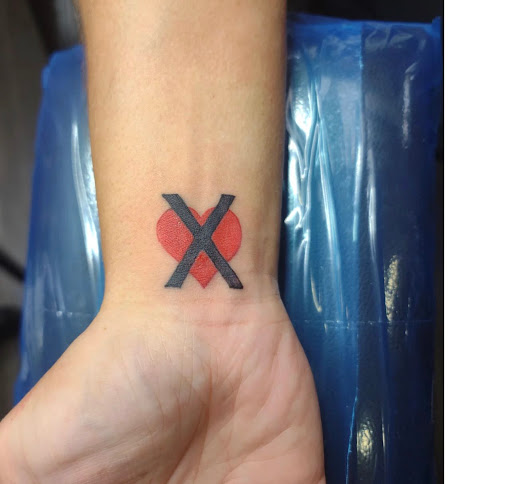 Explore couple ring finger tattoo ideas, creative tattoo ideas in Orange Park, available at Big City Tattoo and Piercing