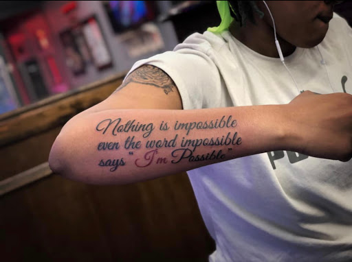 Explore front neck tattoo ideas, creative tattoo ideas in Dekalb, available at Out on a Whim Tattoo