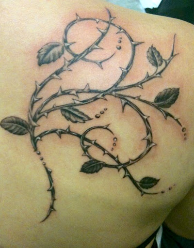 Explore cross forearm tattoo ideas, creative tattoo ideas in Tampa, available at Angel Tattoo