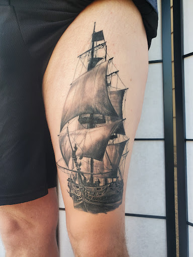 Explore black and gray tattoo sleeve ideas, creative tattoo ideas in Tea, available at Red Arbor Tattoo