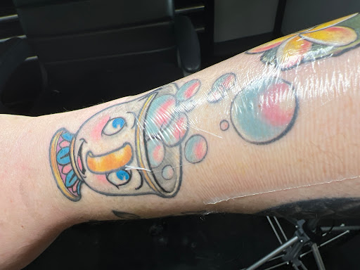 Explore thigh tattoo ideas for females, creative tattoo ideas in Kissimmee, available at Fallen Heroes Tattoo & Piercing (Florida)