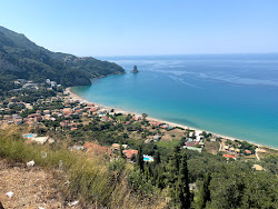 Agios Gordios Plajı'in fotoğrafı ve yerleşim