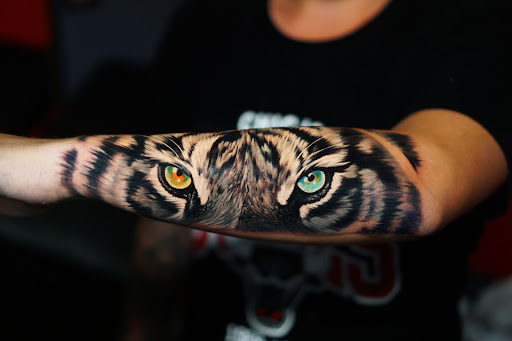 Find under boob tattoo ideas for your next unique tattoo in Houston at INK FUTURE TATTOO