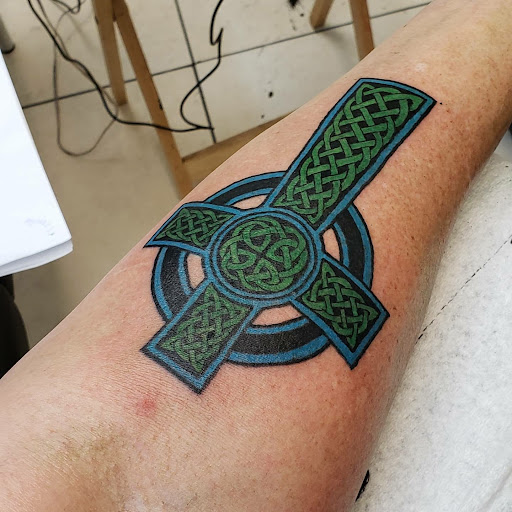 Explore trapezius tattoo ideas, creative tattoo ideas in Mesa, available at Ranger Tattoo & Piercing