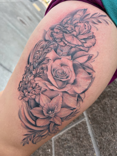 Explore blacked out tattoo ideas, creative tattoo ideas in Redmond, available at Four Flames Tattoo Studio