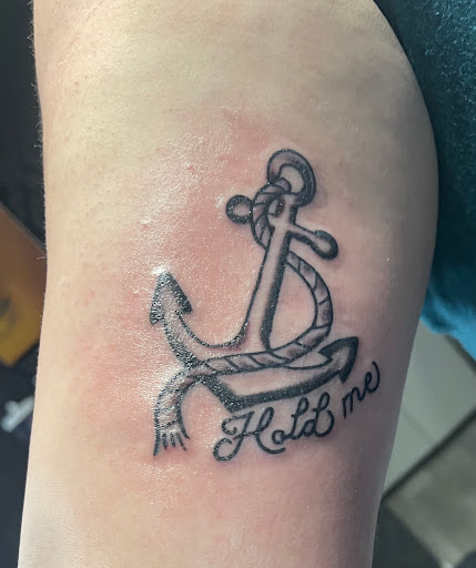 Explore hand tattoos for men ideas, creative tattoo ideas in Terre Haute, available at Birds of Valhalla Tattoos and Fine Art