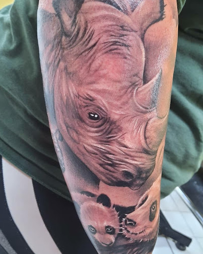 Explore dog tattoo ideas, creative tattoo ideas in Grand Ledge, available at Van Gogh Tattoos