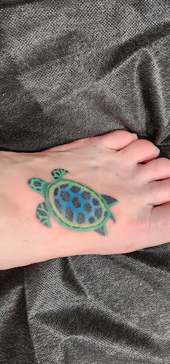 Explore hiraeth tattoo ideas, creative tattoo ideas in Orange, available at Three Diamonds Tattoo