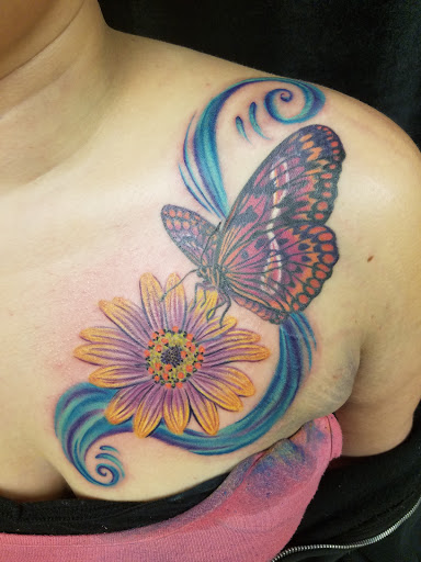 Explore abdomen tattoo ideas, creative tattoo ideas in Elkhart, available at Juicy Tattoo and Piercing